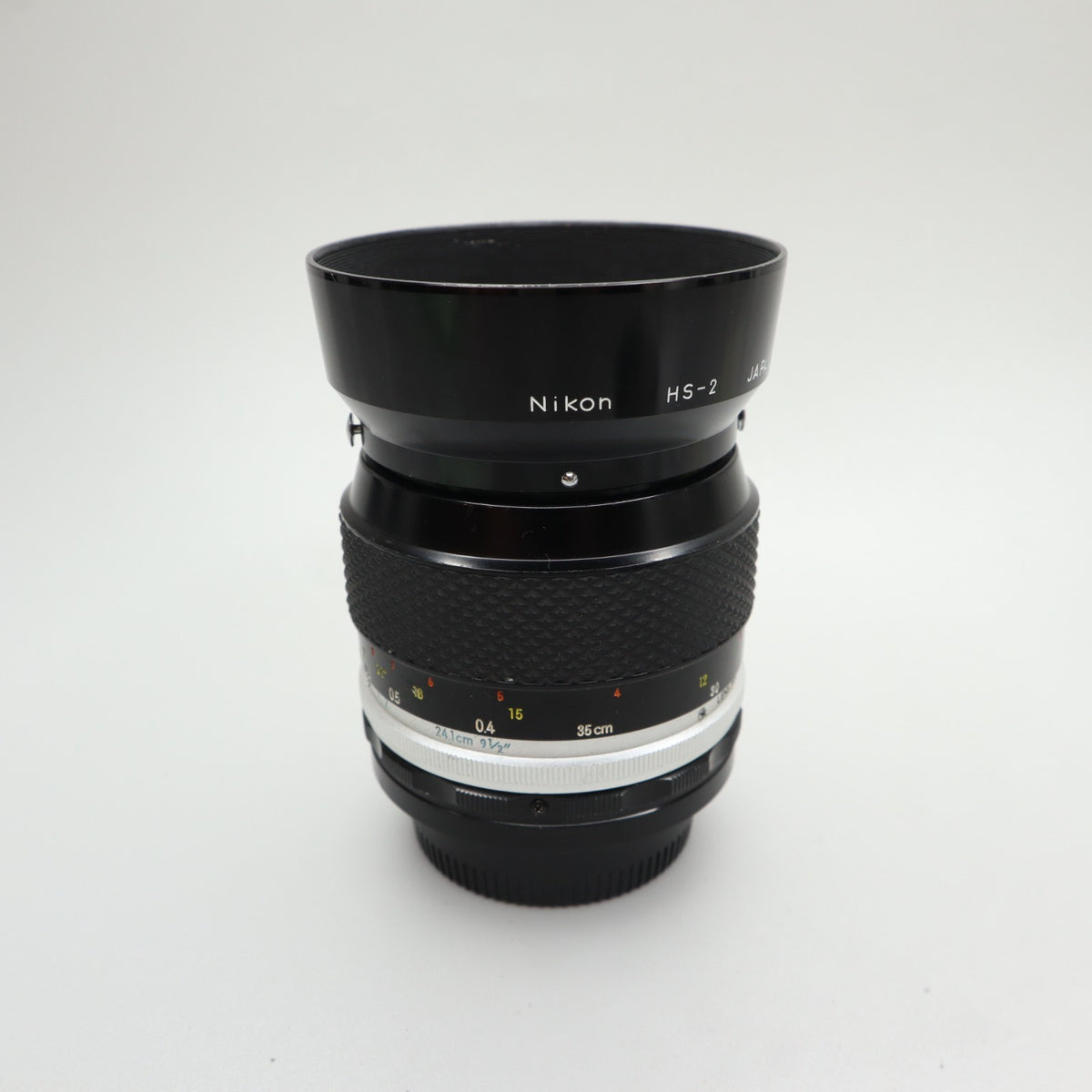 Nikon Micro-Nikkor-P C Auto 55mm f/3.5 Pre-AI con paraluce HS-2