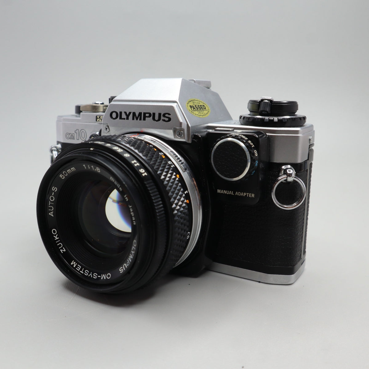 Olympus OM-10 con Zuiko 50mm f/1.8 e Manual Adapter