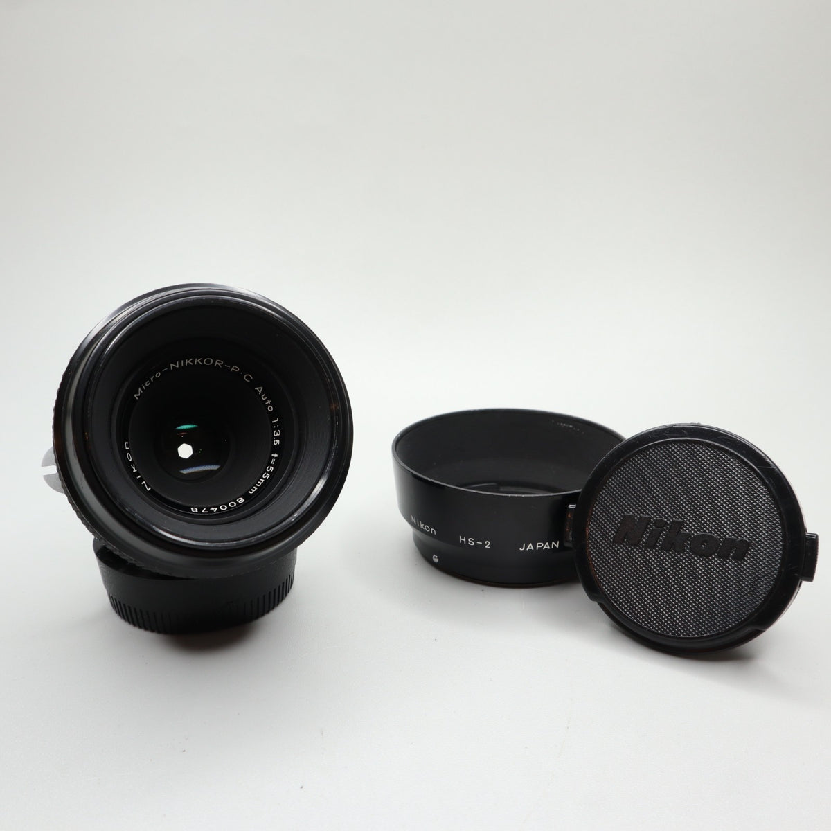 Nikon Micro-Nikkor-P C Auto 55mm f/3.5 Pre-AI con paraluce HS-2