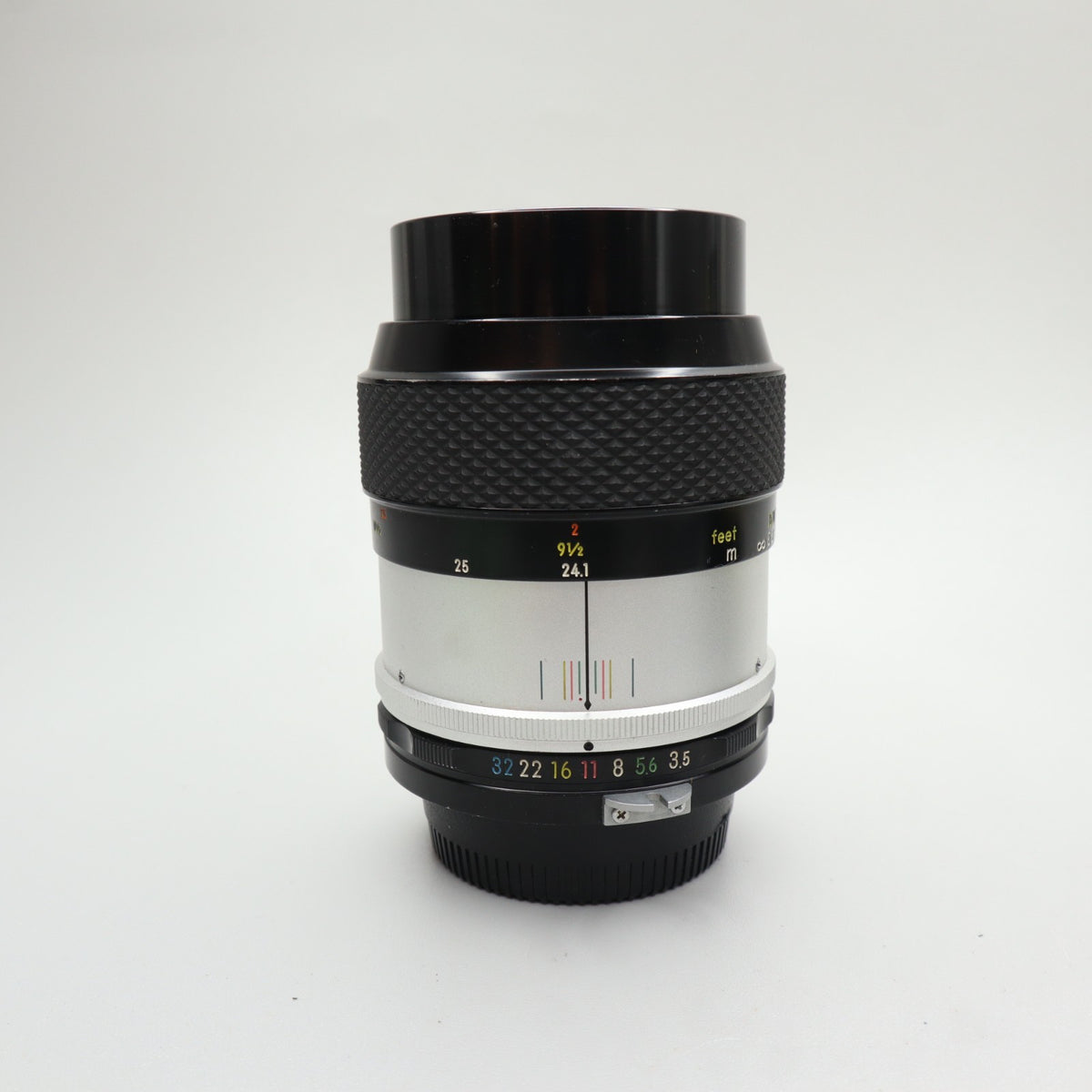 Nikon Micro-Nikkor-P C Auto 55mm f/3.5 Pre-AI con paraluce HS-2