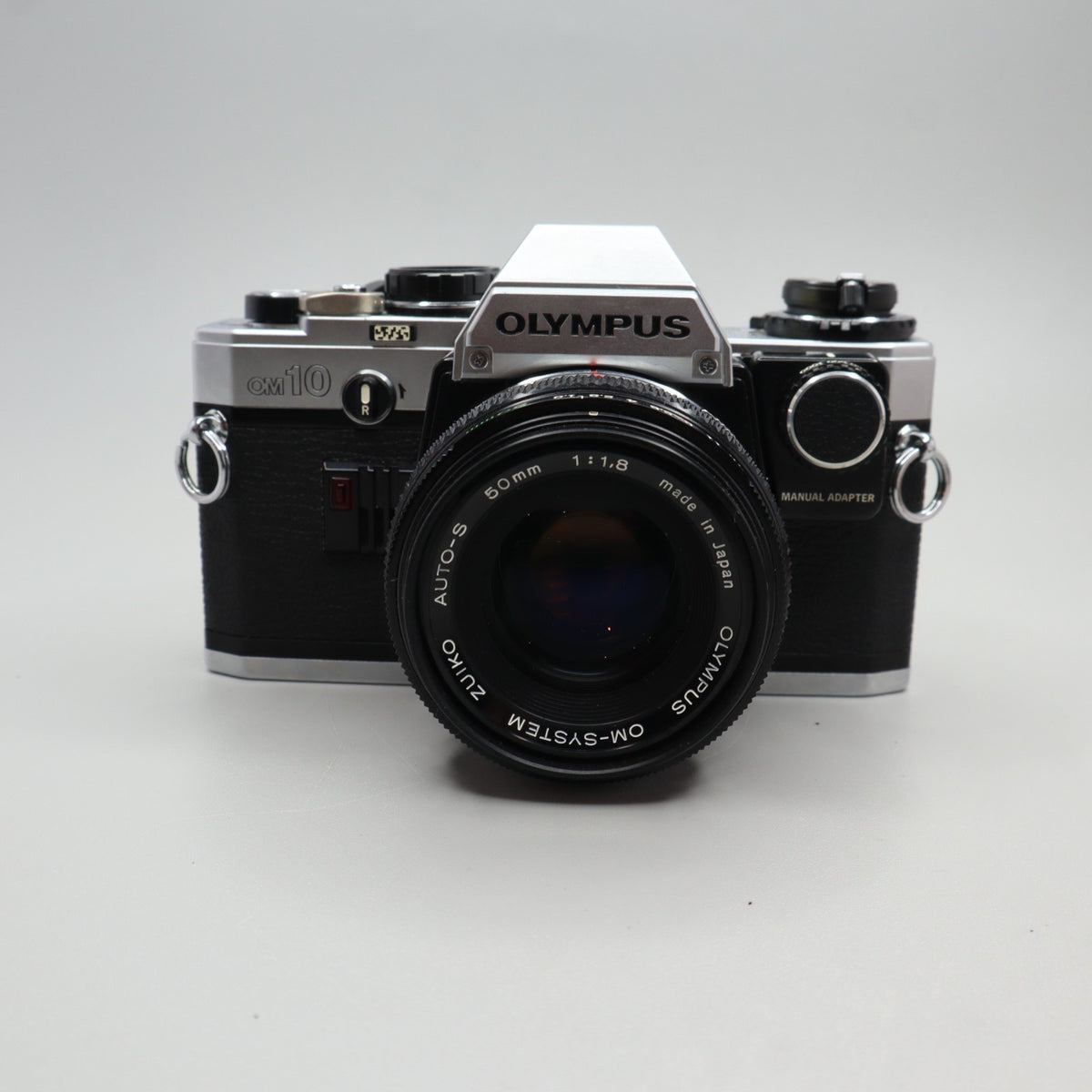Olympus OM-10 con Zuiko 50mm f/1.8 e Manual Adapter