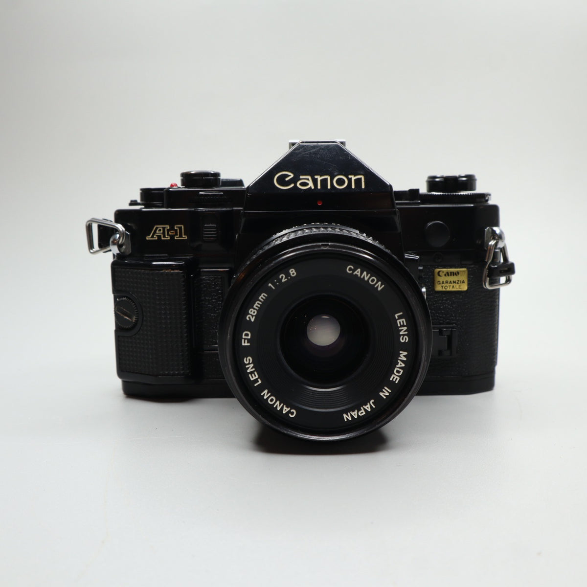 Canon A-1 con obiettivo Canon FD 28mm f/2.8