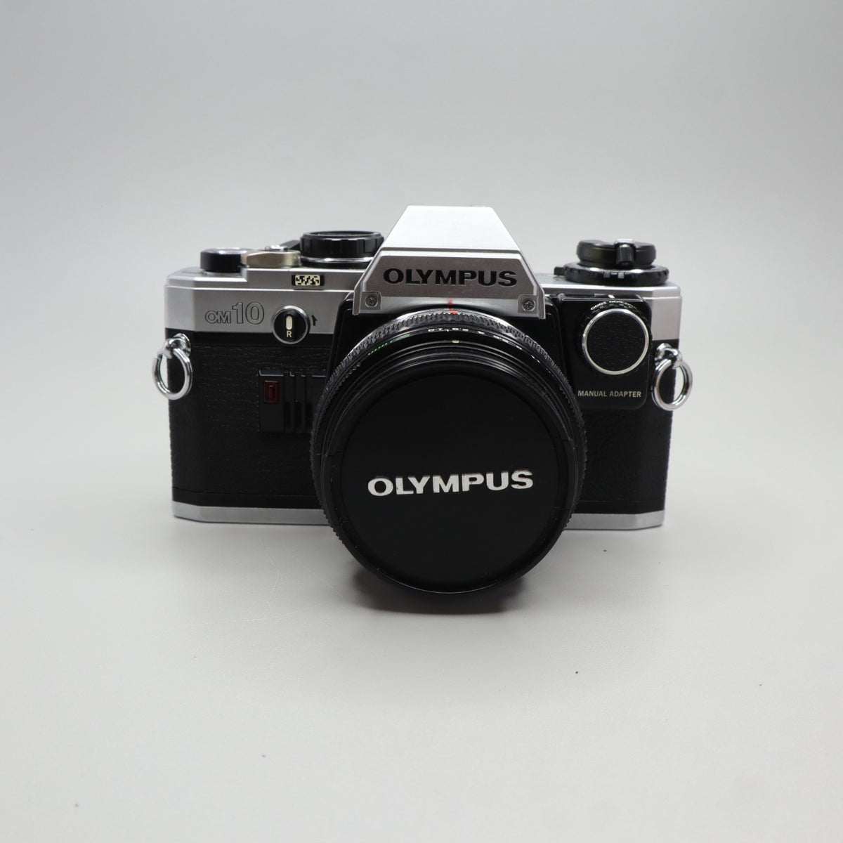 Olympus OM-10 con Zuiko 50mm f/1.8 e Manual Adapter